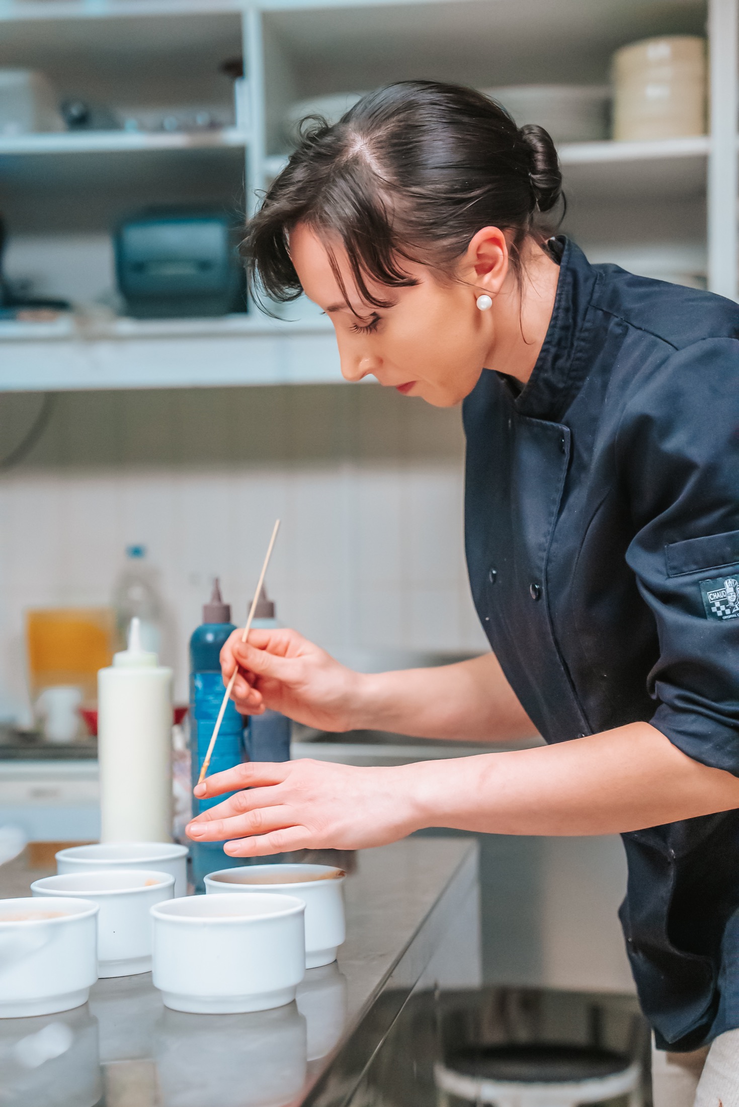 Chef preparing a dish at Chateau de Looz