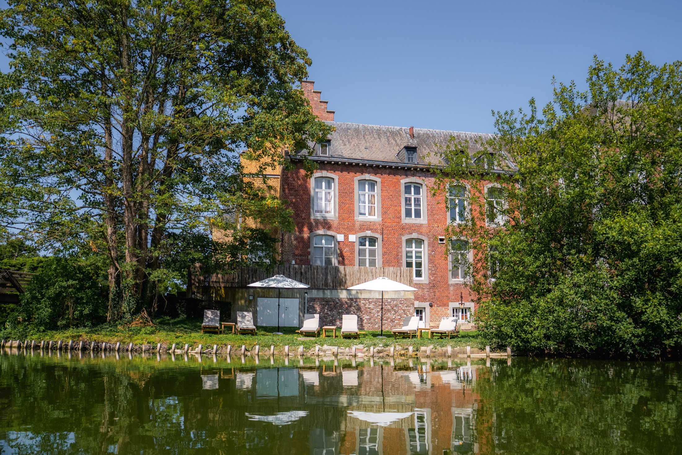 Chateau de Looz reflected in the surrounding water