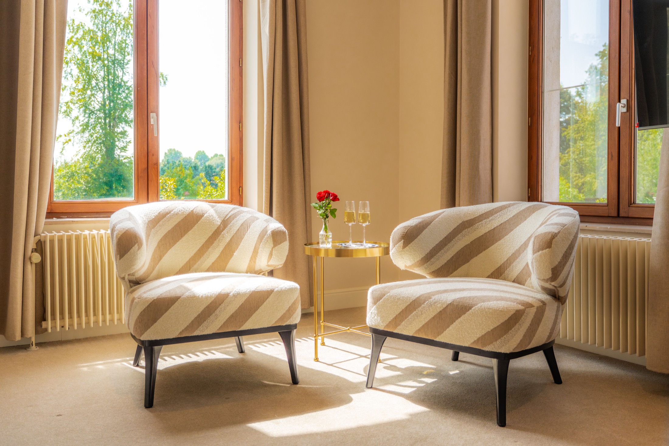 Quiet seating beside a guest room window