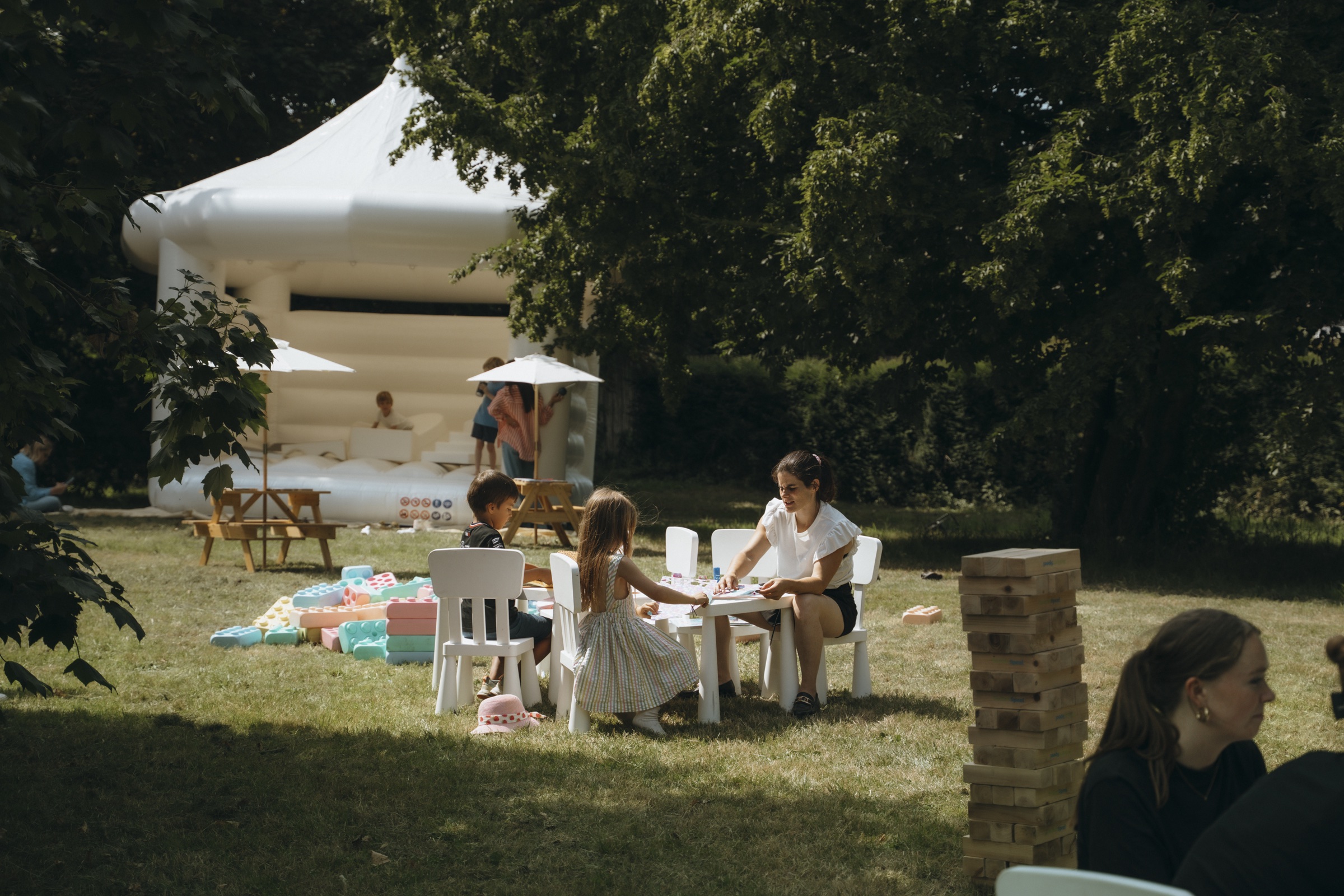 Children enjoying outdoor activities during a wedding at Chateau de Looz