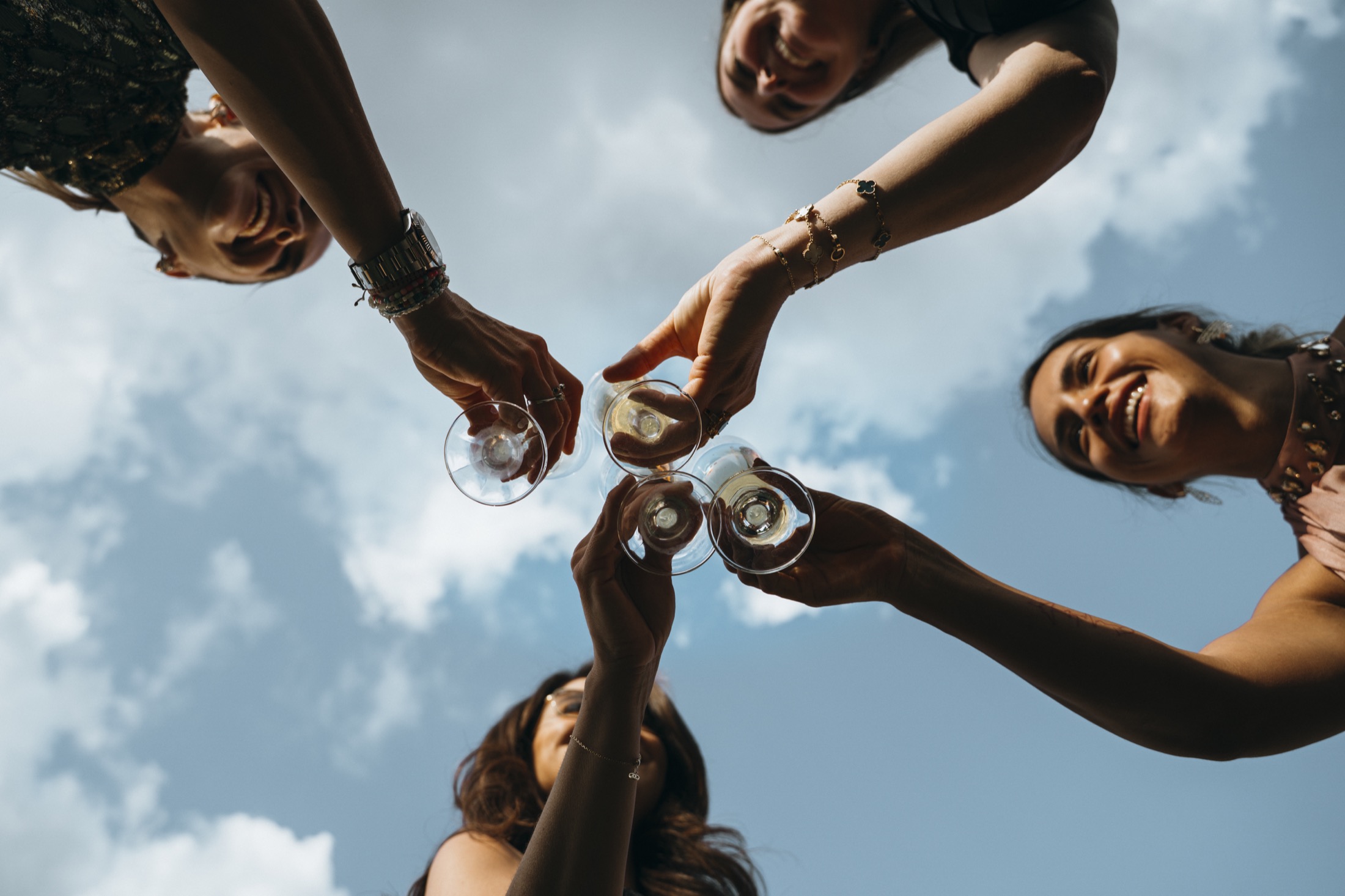 Wedding toast beneath the open sky at Chateau de Looz